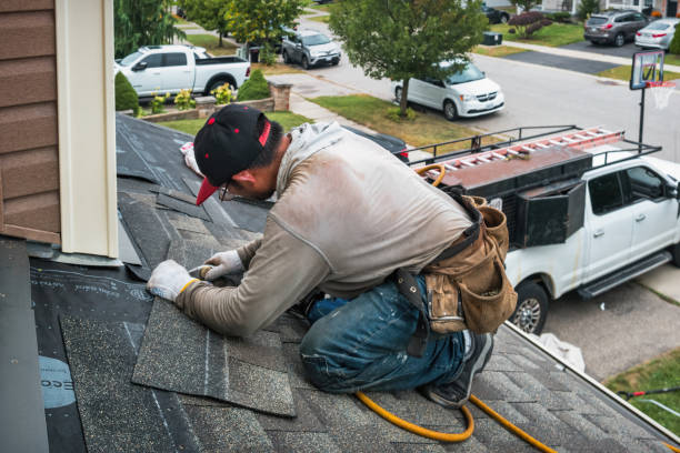 Professional Roofing technician working in Maine, NY